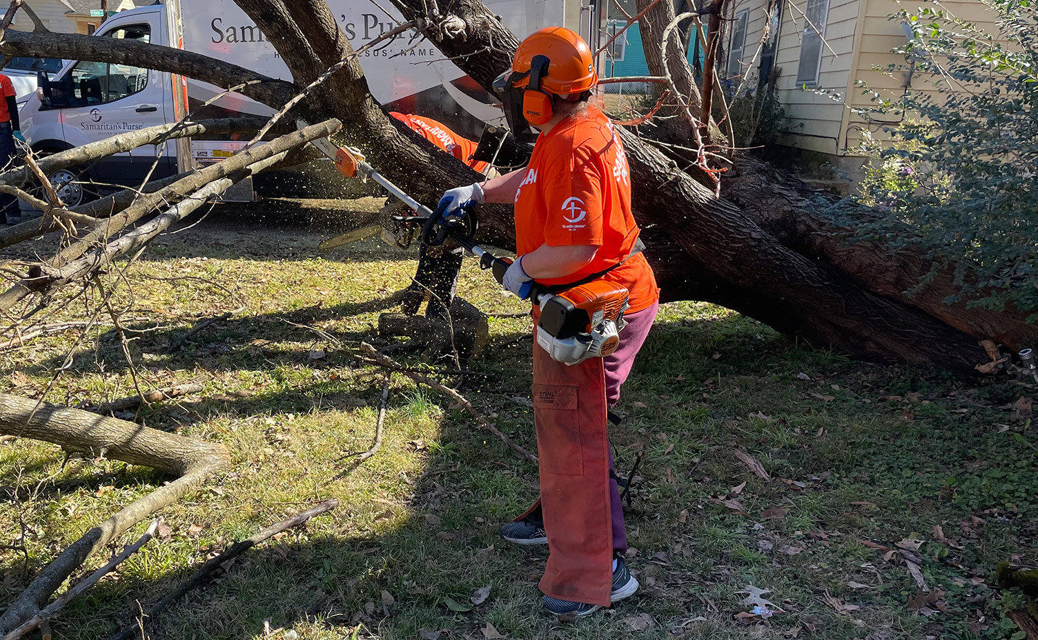 U.S. Disaster Relief Volunteer working to remove debris