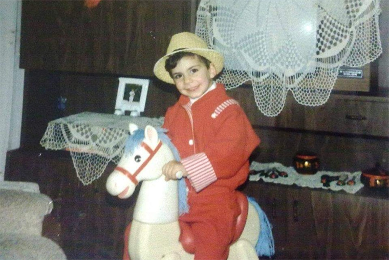 Young Manar with Rocking Horse