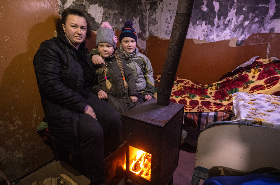 Olga spent two months underground in a cellar turned bomb shelter. The war in Ukraine stripped her of nearly everything. Heading into winter, her town had already been without electricity for several months. Samaritan’s Purse partnered with local churches to deliver wood stoves to help Olga and many other families survive the harsh winter. We also worked with church partners to provide warm clothing, blankets, tarps, hygiene kits, solar lights, and construction materials.