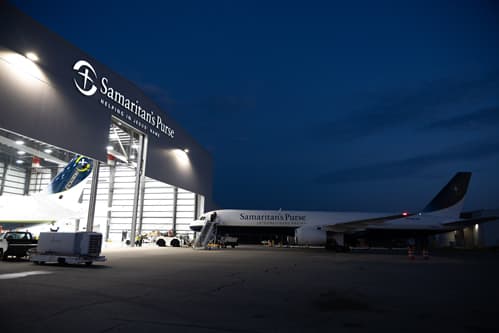 PLane being prepared in front of carrier.